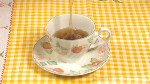 Pouring hot tea in cup Stock Footage 889841