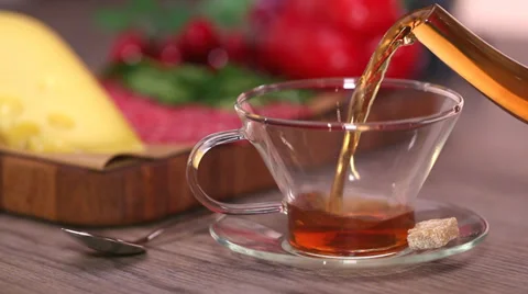 Pouring hot tea HD Stock Footage 32496114