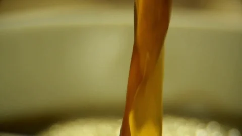 Pouring jet of coffee in slow motion Stock Footage 76249759