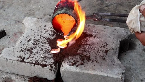Pouring lava during a casting Stock Footage 150716505