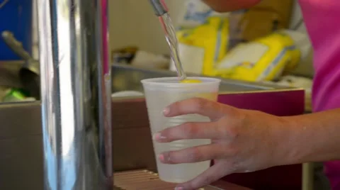 Pouring Lemonade into Cup at Fair Stock-Footage 46631234