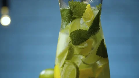 Pouring lemonade into a glass Stock Footage 142885031