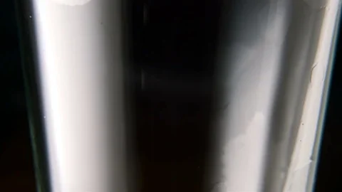Pouring light beer into glass. Stock Footage 73600405