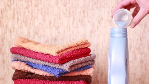 Pouring liquid detergent back into the bottle Stock Footage 84675815