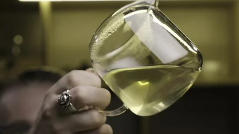 Pouring a Liquid in a Laboratory Setting Requires Precise Measurement and Safety Stock Photos
