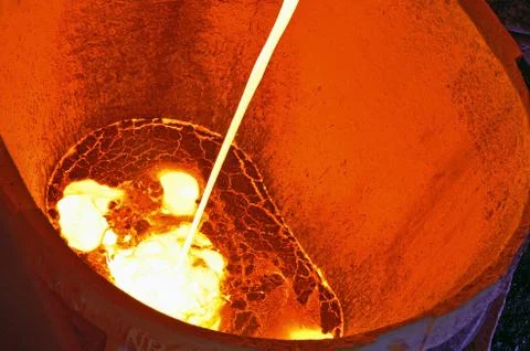 Pouring of liquid metal Stock Photos