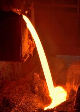Pouring of liquid metal Stock Photos