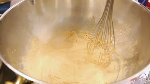 Pouring liquid nitrogen into a bowl Stock Footage 129273436
