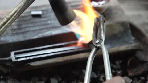 Pouring liquid silver metal high temperature workshop jewelry making process Video stock 311568775