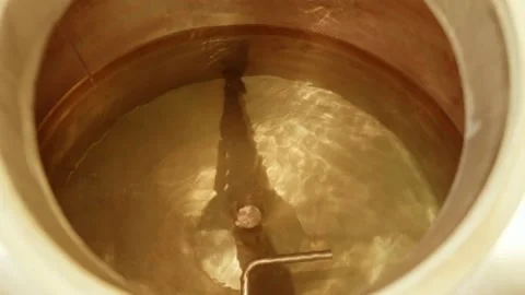 Pouring malt into the beer brewing unit Stock Footage 158266738
