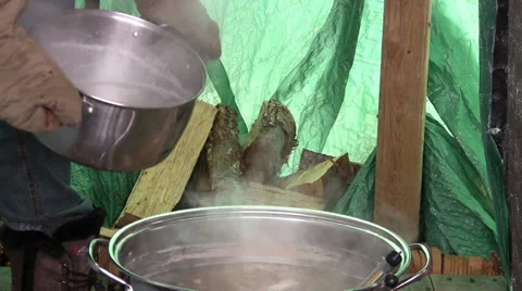 Pouring Maple Sap from Pre Warmer To Evaporator in Nova Scotia Canada. 動画素材 37227002