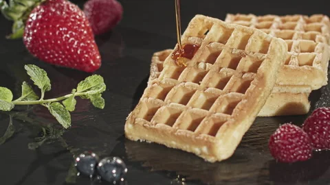 Pouring Maple Syrup over Waffles Stock Footage 135655788