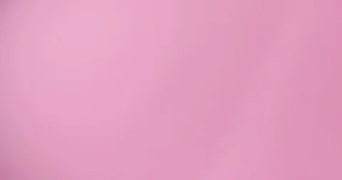 Pouring melt ruby chocolate. Closeup shot. Video stock 127613862