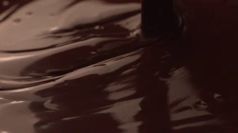 Pouring melted chocolate in super slow motion, shot on Phantom Flex 4K Stock Footage