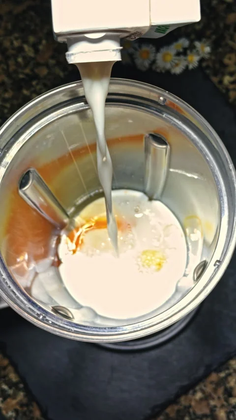 Pouring Milk into Blender close-up Stock Footage 277103129