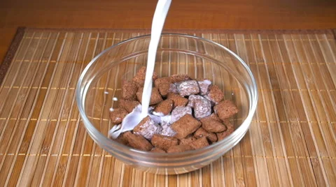 Pouring milk into Breakfast 2, Slow Motion Video stock 59901657