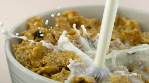 Pouring milk on cereal, Slow Motion Stock Footage