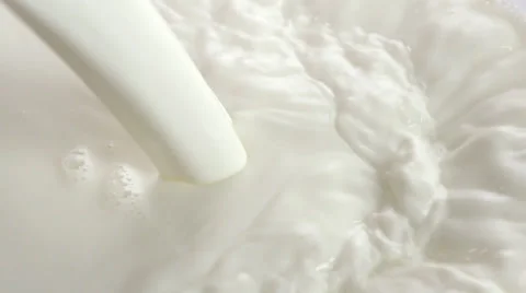 Pouring milk closeup Stock Footage 37111219