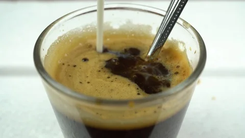 Pouring Milk into Coffee, Close Up Stock Footage 108258237