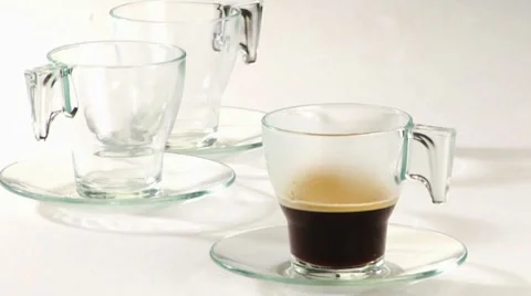 Pouring milk into coffee Stock Footage 8571101