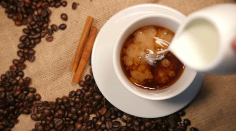 Pouring Milk into Coffee 動画素材 59938092