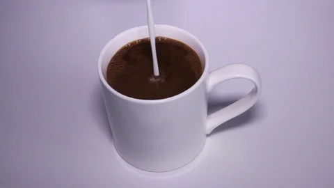 Pouring Milk In Coffee Stock Footage 86374652
