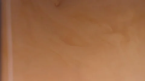 Pouring milk into coffee Video stock 148334059