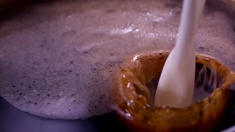 Pouring Milk in the Coffee Super Slow-motion 1000fps Stock Footage