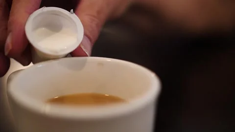 Pouring Milk Into a Cup, A Simple Tutorial Stock Footage 262290866