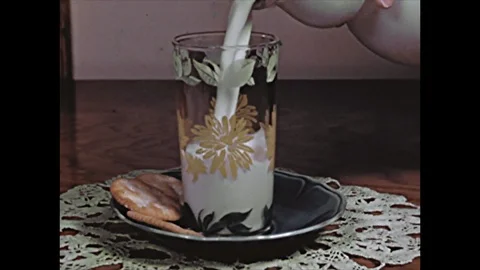 Pouring Milk Into Drinking Glass Stock Footage 114016027