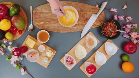 Pouring milk into the egg mixture Stock-Footage 249080218
