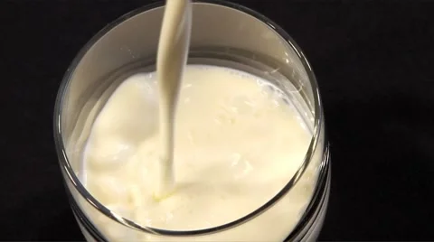 Pouring milk Stock Footage 8835782