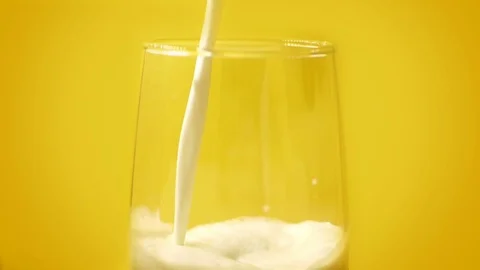 Pouring milk Stock Footage 80361554