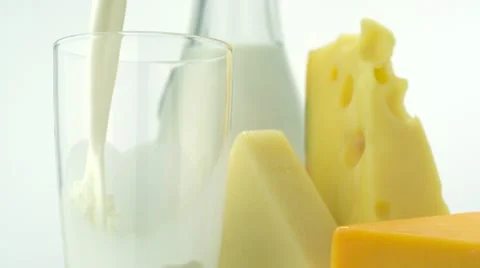 Pouring milk into glass, Slow Motion Stock Footage