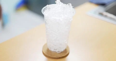Pouring milk an iced latte Stock Footage 172562989