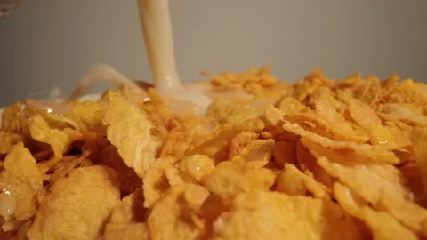 Pouring milk over Corn Flakes 動画素材 149283248