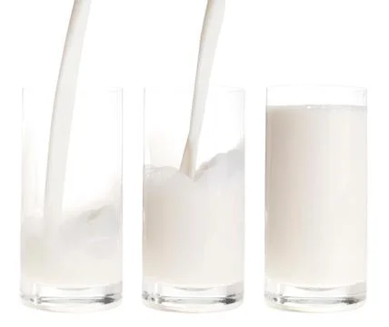 Pouring milk Stock Photos