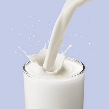 Pouring milk Stock Photos