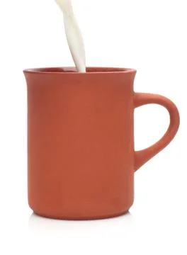 Pouring the milk Stock Photos