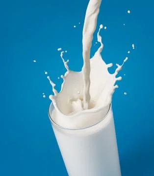 Pouring milk Foto stock