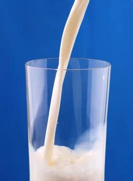 Pouring milk Stock Photos