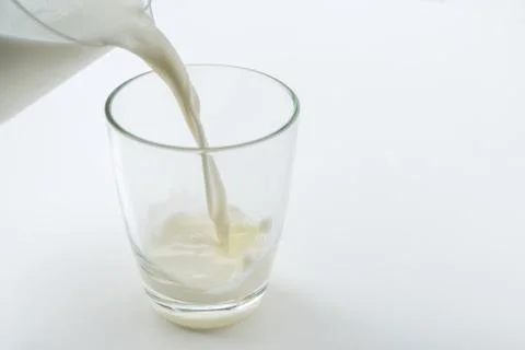 Pouring milk Foto stock