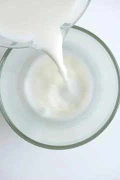 Pouring milk Foto stock