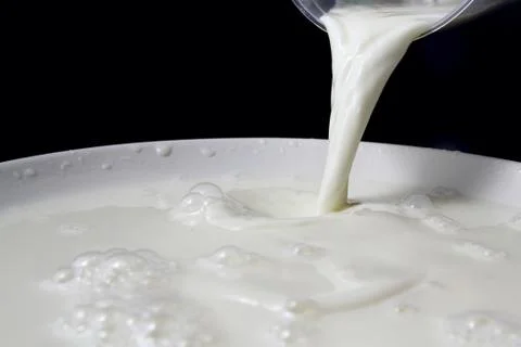 Pouring Milk Stock Photos
