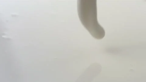 Pouring milk, slow motion Stock Footage 61676269