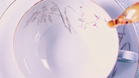 Pouring Milk in Tea Cup on the Table Super slow motion 1000fps 스톡 동영상 130987254
