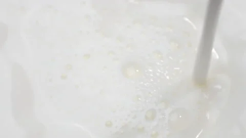 Pouring milk in white 库存影片 162593185