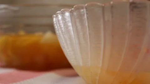 Pouring Mixed Fruit Cocktail With Juice Into Drinking Glass 動画素材 340298480