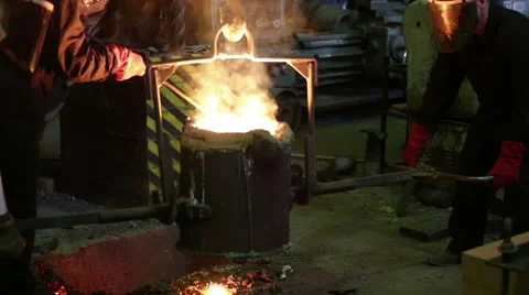 Pouring of molten iron Stock Footage 61383709