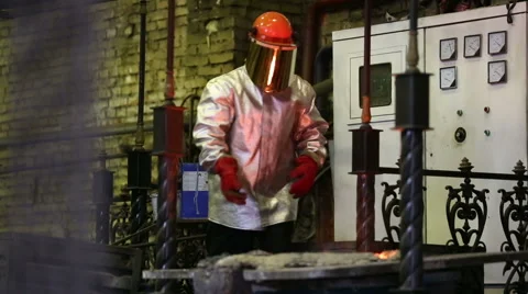 Pouring of molten iron Stock Footage 61420290